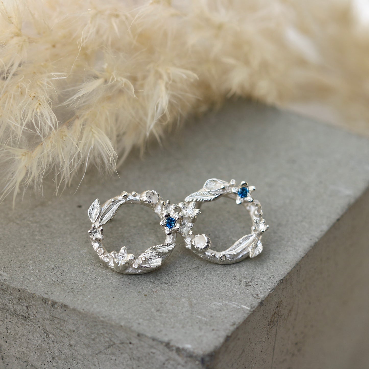 Floral wreath studs