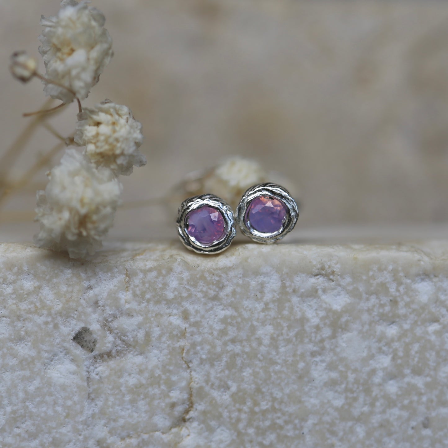 Opalescent pink seed studs
