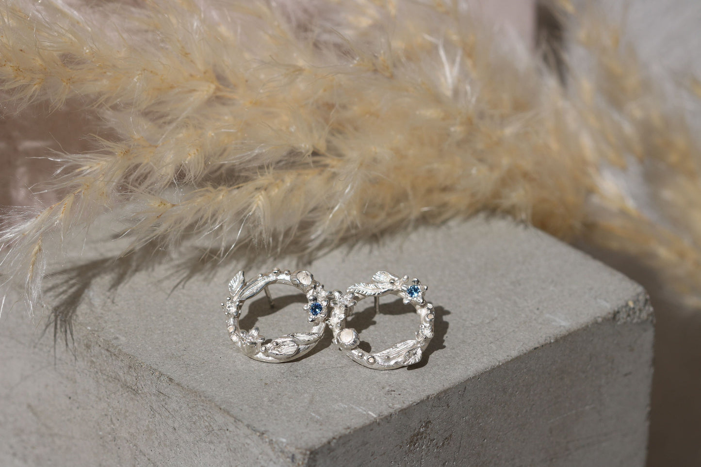 Floral wreath studs