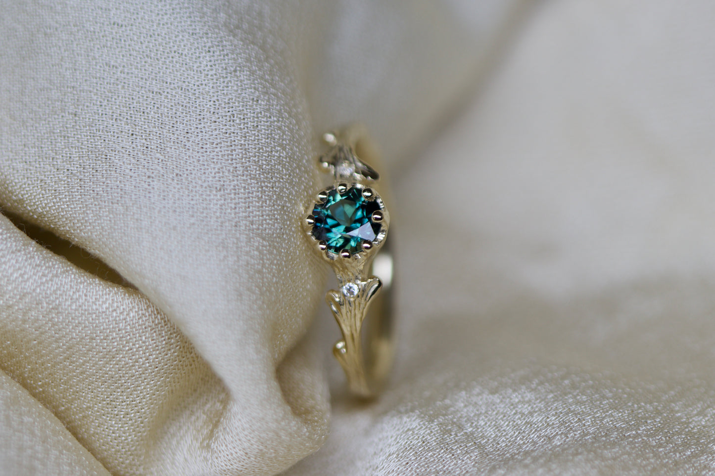 Teal sapphire & Hawthorne ring