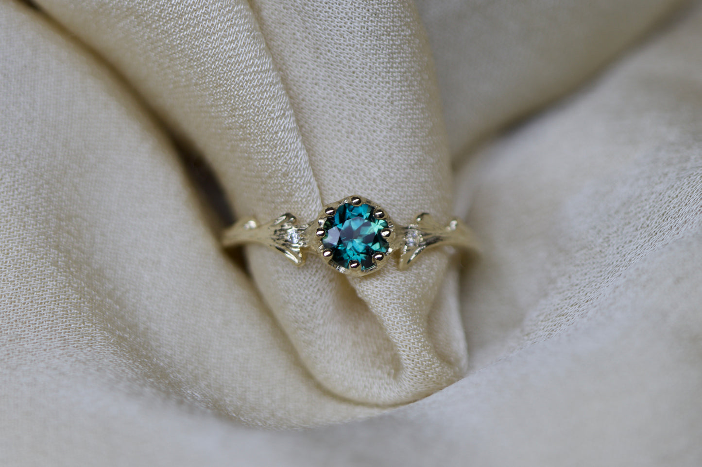 Teal sapphire & Hawthorne ring