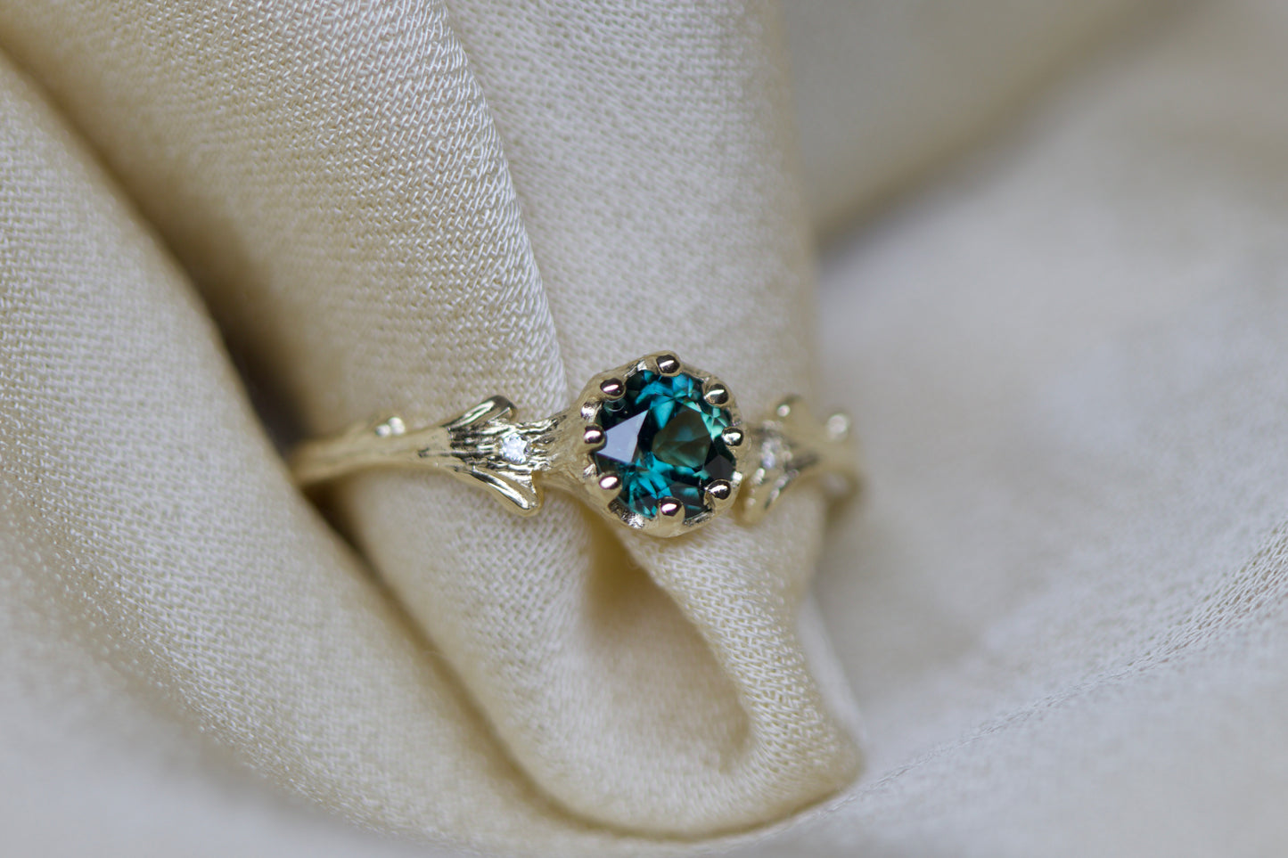 Teal sapphire & Hawthorne ring