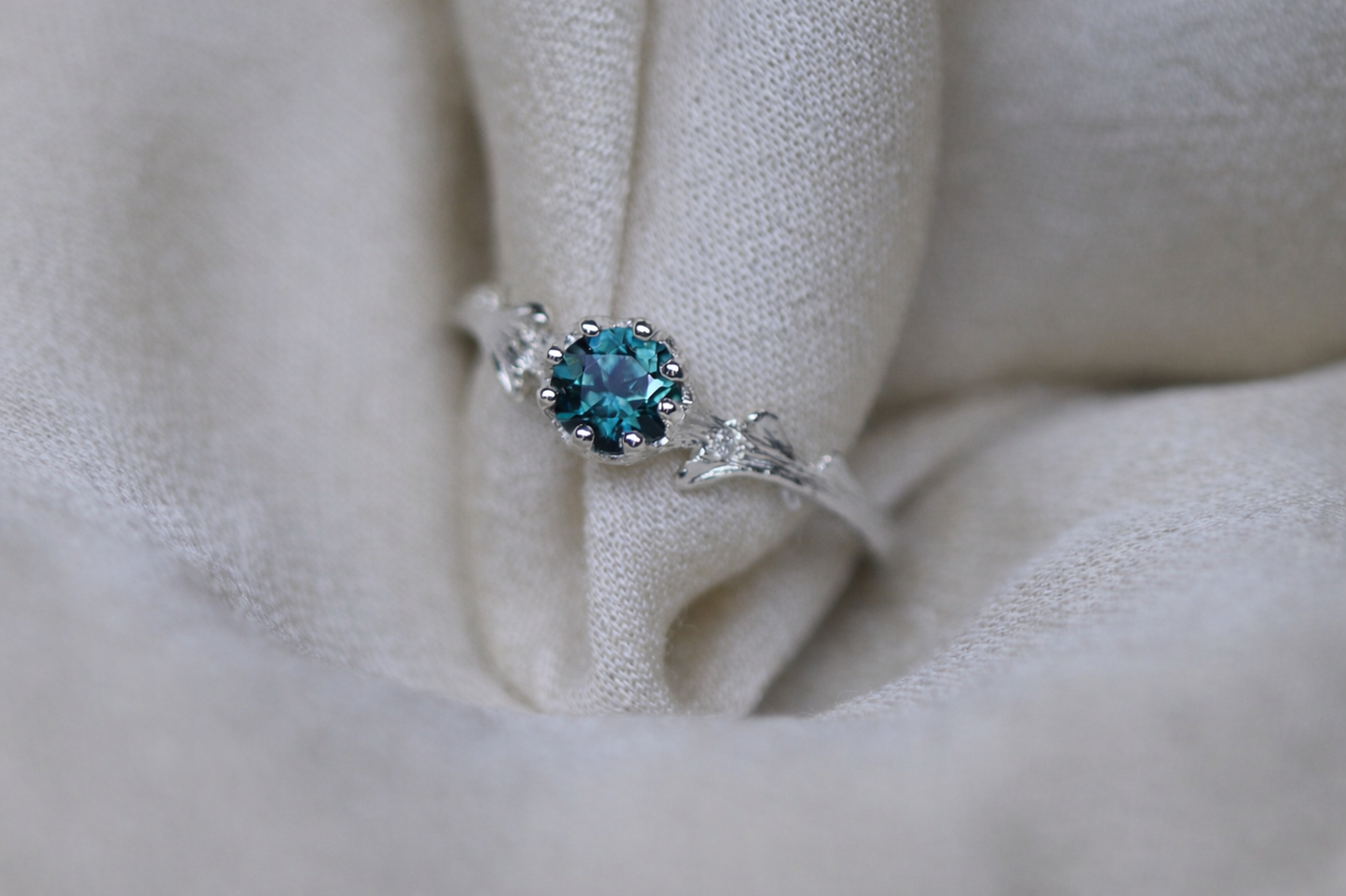 Teal sapphire & Hawthorne ring