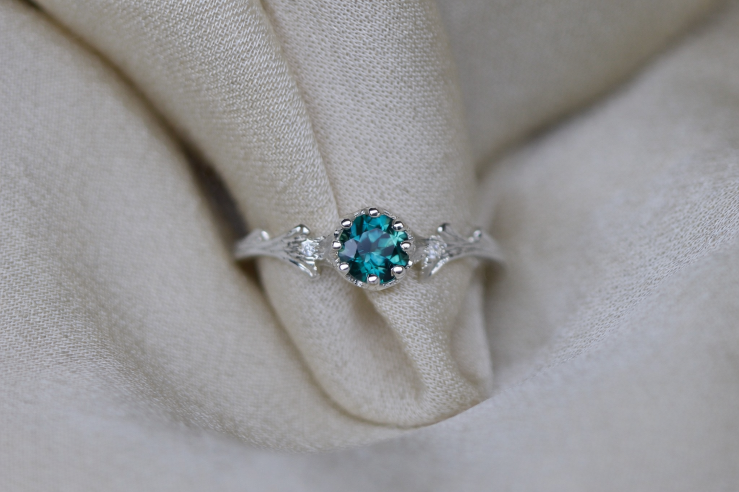 Teal sapphire & Hawthorne ring