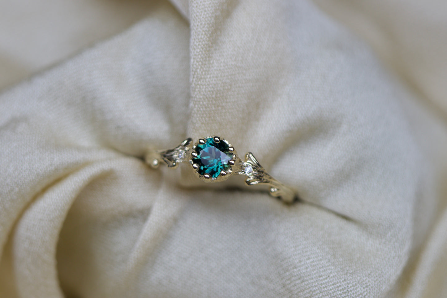 Teal sapphire & Hawthorne ring
