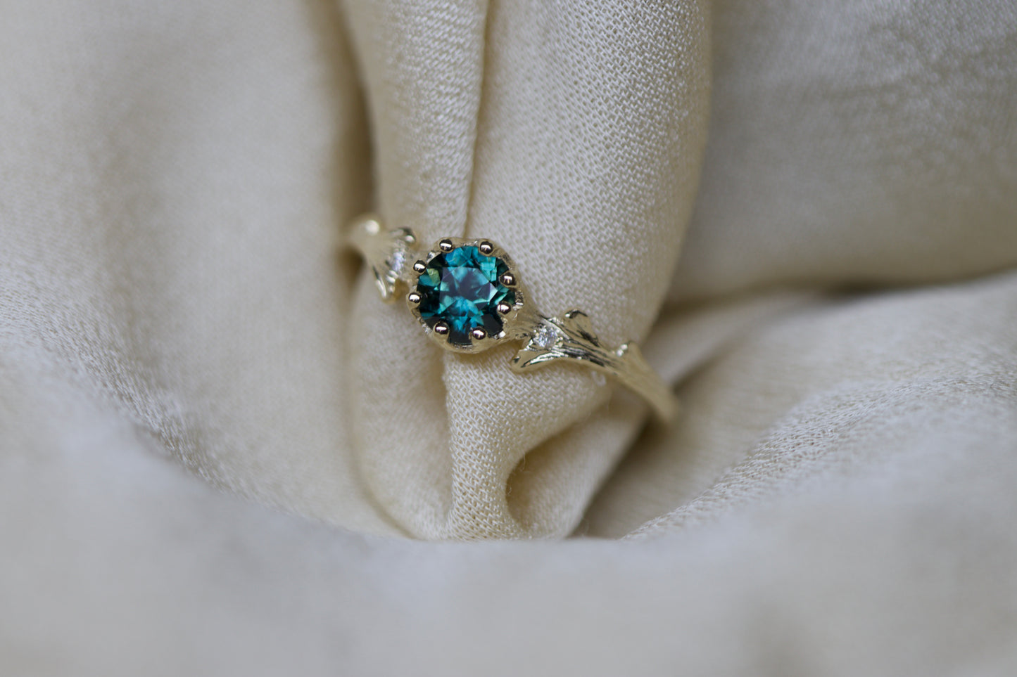 Teal sapphire & Hawthorne ring